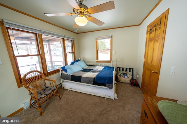 carpeted bedroom with ceiling fan and ornamental molding