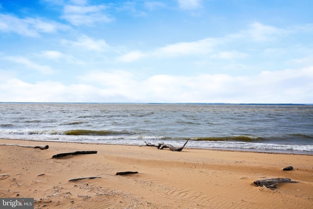 property view of water featuring a view of the beach