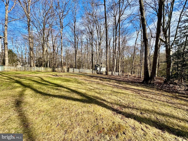 view of yard with fence