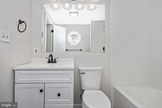 full bathroom with  shower combination, vanity, and toilet