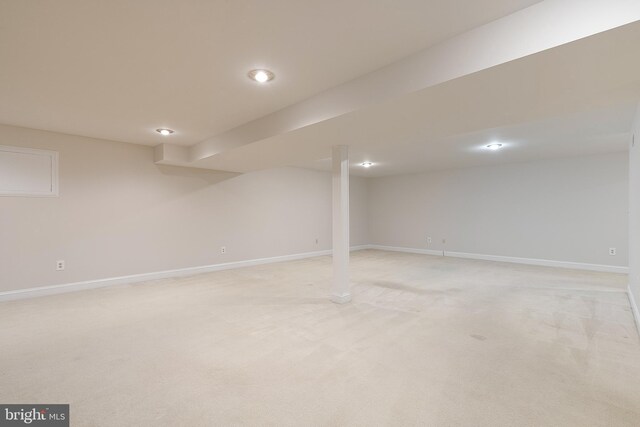 10928 Woodland Falls Dr, Great Falls, VA 22066 - finished below grade area with light colored carpet, baseboards, and recessed lighting