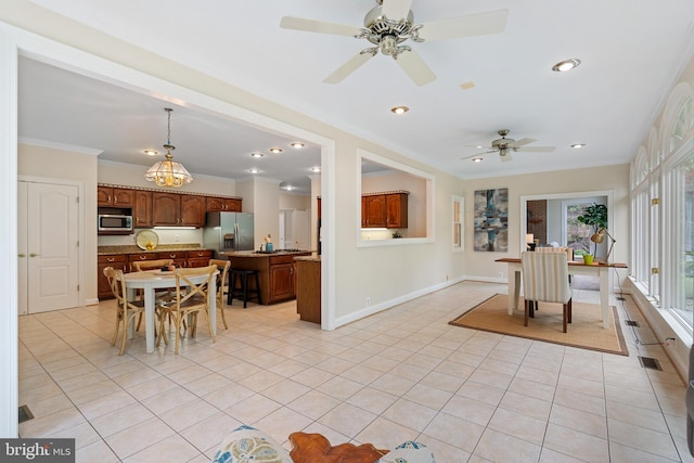 10928 Woodland Falls Dr, Great Falls, VA 22066 - dining space with crown molding, light tile patterned floors, recessed lighting, a ceiling fan, and baseboards