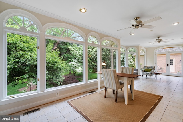 10928 Woodland Falls Dr, Great Falls, VA 22066 - sunroom / solarium with tile patterned flooring, healthy amount of natural light, ornamental molding, and french doors