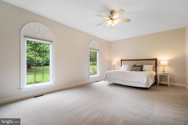 10928 Woodland Falls Dr, Great Falls, VA 22066 - carpeted bedroom featuring baseboards and ceiling fan
