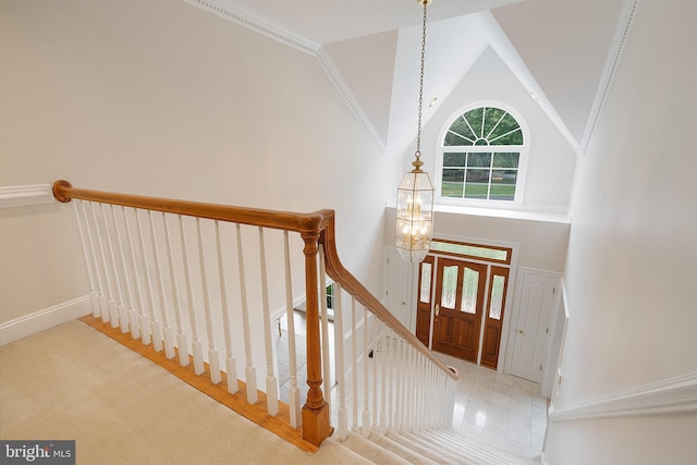10928 Woodland Falls Dr, Great Falls, VA 22066 - stairs featuring a chandelier and high vaulted ceiling