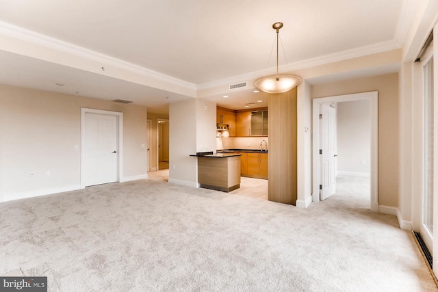 unfurnished living room with light carpet, baseboards, visible vents, and ornamental molding