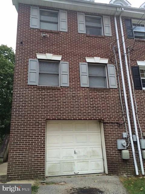 view of home's exterior with a garage