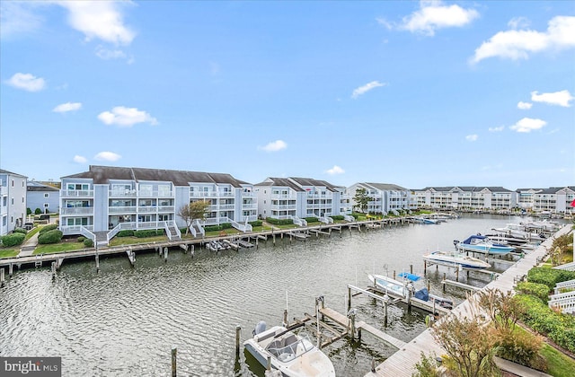 water view featuring a dock