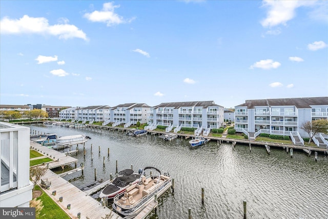 property view of water featuring a boat dock