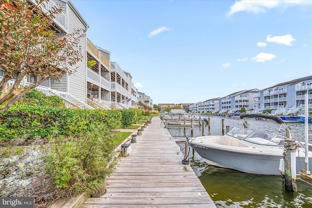 dock area with a water view