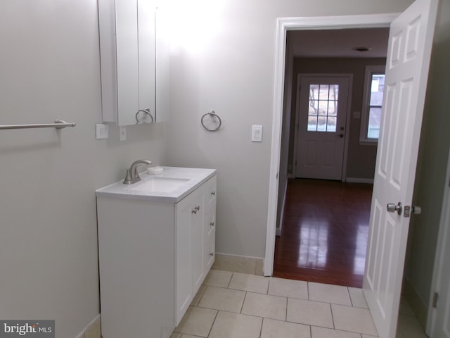 bathroom with vanity and tile patterned floors