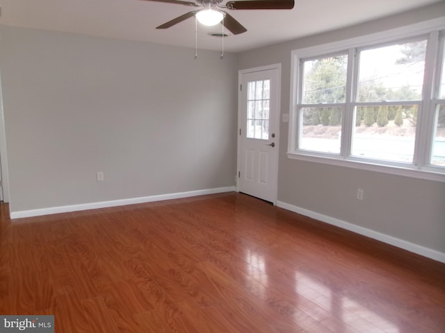 interior space featuring hardwood / wood-style floors and ceiling fan