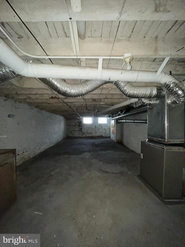 basement featuring heating unit