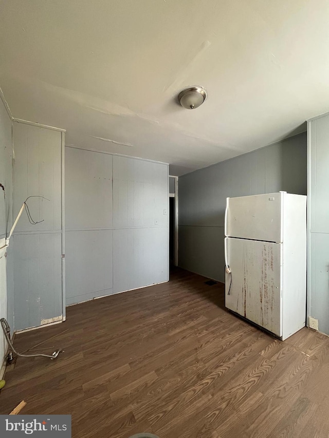 empty room with wood-type flooring