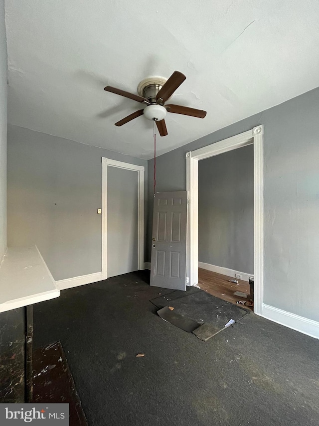 unfurnished bedroom with a closet and ceiling fan