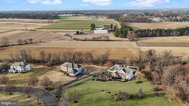 birds eye view of property featuring a rural view