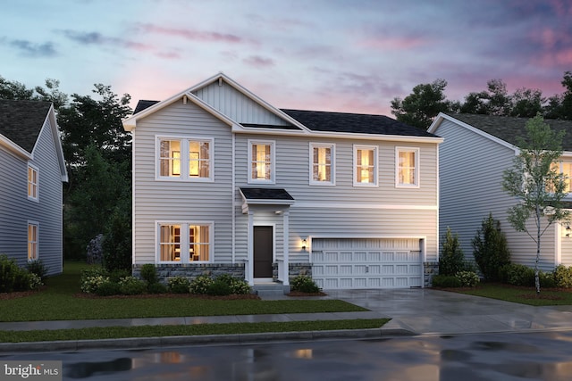 view of front of property featuring a garage