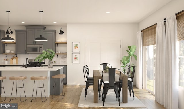 dining area featuring light hardwood / wood-style floors