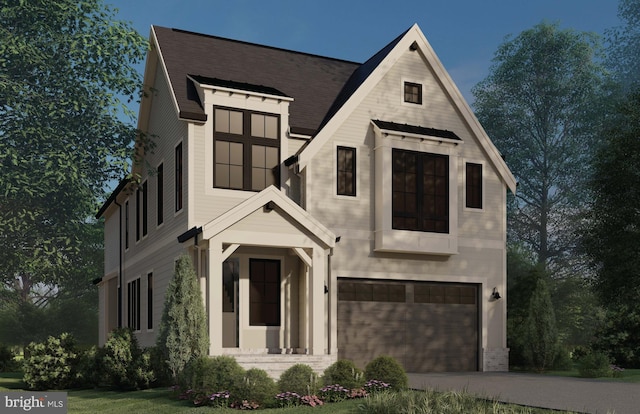 view of front of home with an attached garage and driveway