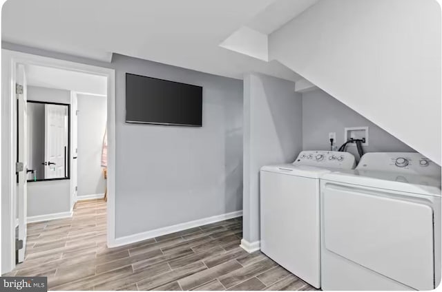 laundry room featuring separate washer and dryer