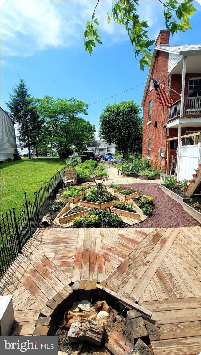 229 N Linden Ave N Unit 1, Greencastle, PA 17225 - wooden terrace with a vegetable garden