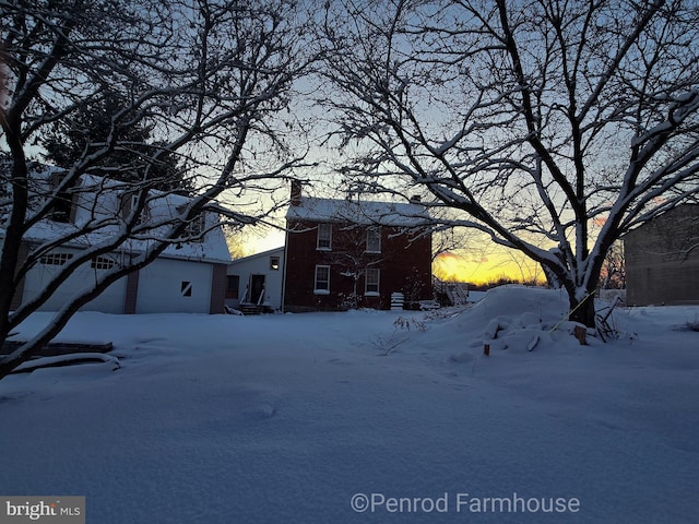 229 N Linden Ave N Unit 1, Greencastle, PA 17225 - view of snowy exterior featuring a chimney