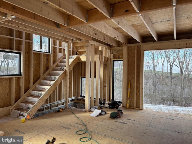 misc room featuring stairway