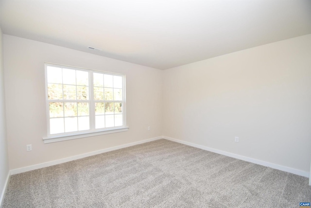 empty room with carpet flooring