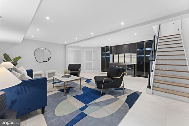 living room with stairs, visible vents, and recessed lighting