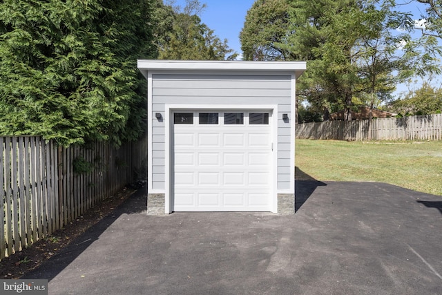 garage featuring fence