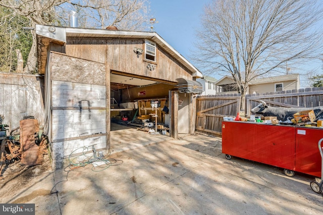 view of side of property featuring an outdoor structure