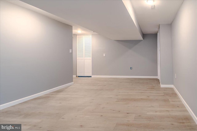 basement with light wood-type flooring