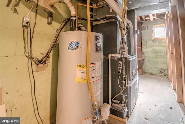 utility room with water heater