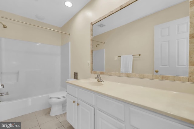 bathroom featuring visible vents, toilet, tub / shower combination, vanity, and tile patterned flooring