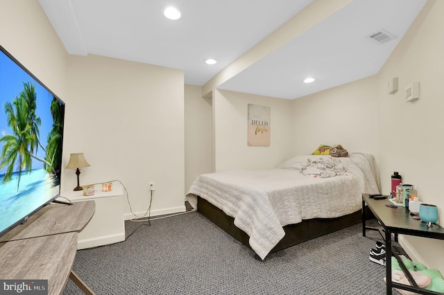 bedroom with carpet floors, recessed lighting, visible vents, and baseboards