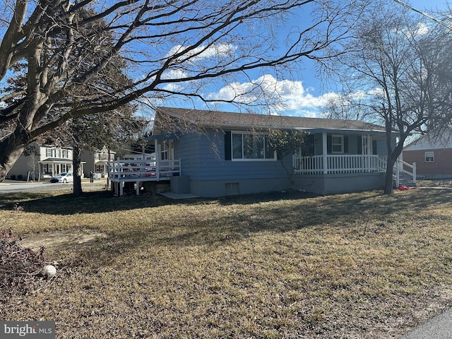 view of front of home with a front yard