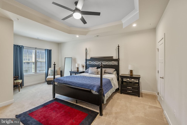 bedroom with recessed lighting, a raised ceiling, carpet flooring, and baseboards