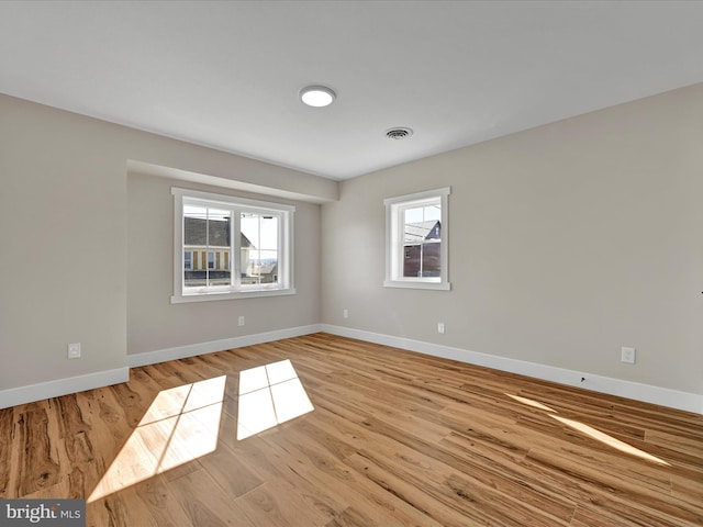 empty room featuring light hardwood / wood-style floors