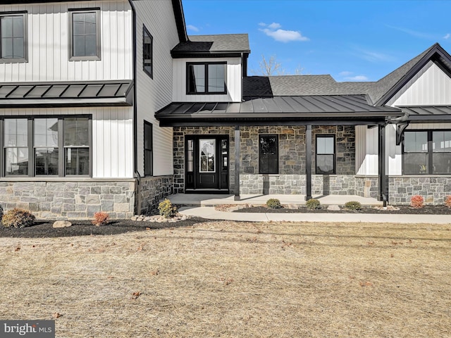 modern farmhouse with a front yard