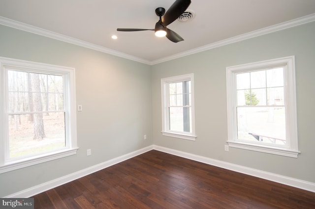 spare room with a ceiling fan, crown molding, baseboards, and dark wood-type flooring