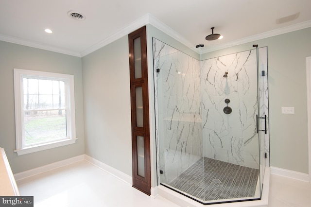 full bath featuring ornamental molding, baseboards, visible vents, and a marble finish shower