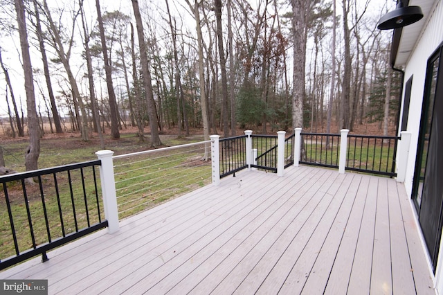 deck featuring a lawn