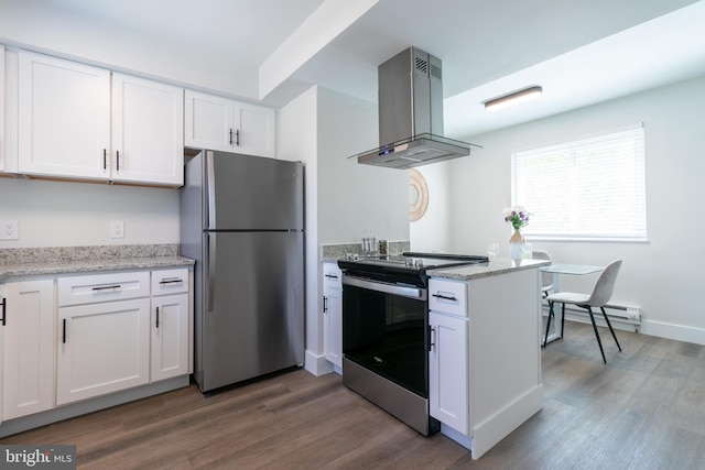 kitchen with appliances with stainless steel finishes, white cabinets, and island range hood