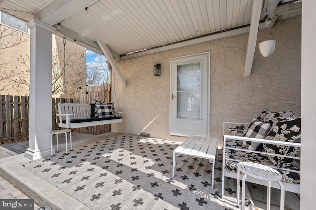 view of patio / terrace with fence