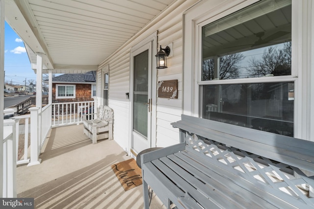 wooden deck featuring a porch