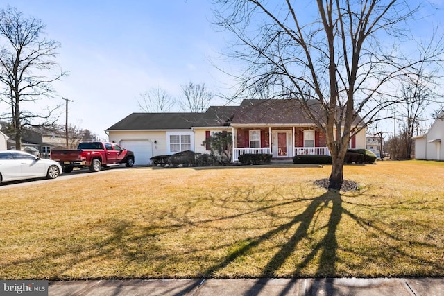 ranch-style house with a porch, a garage, and a front yard