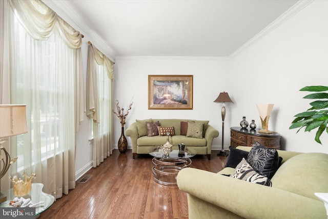 living room featuring ornamental molding and hardwood / wood-style floors