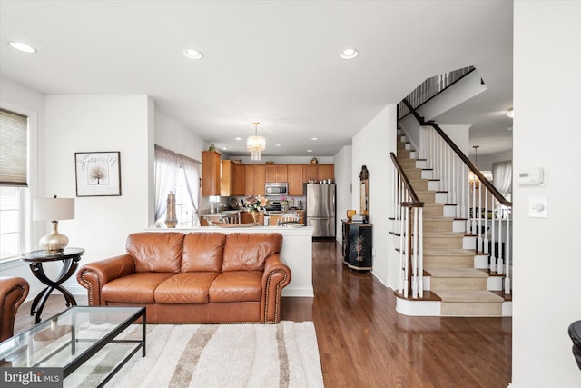 living room featuring dark hardwood / wood-style flooring