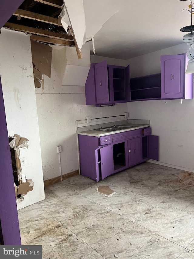 kitchen with sink and blue cabinets