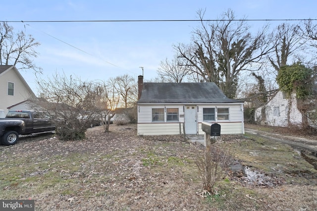 view of new england style home